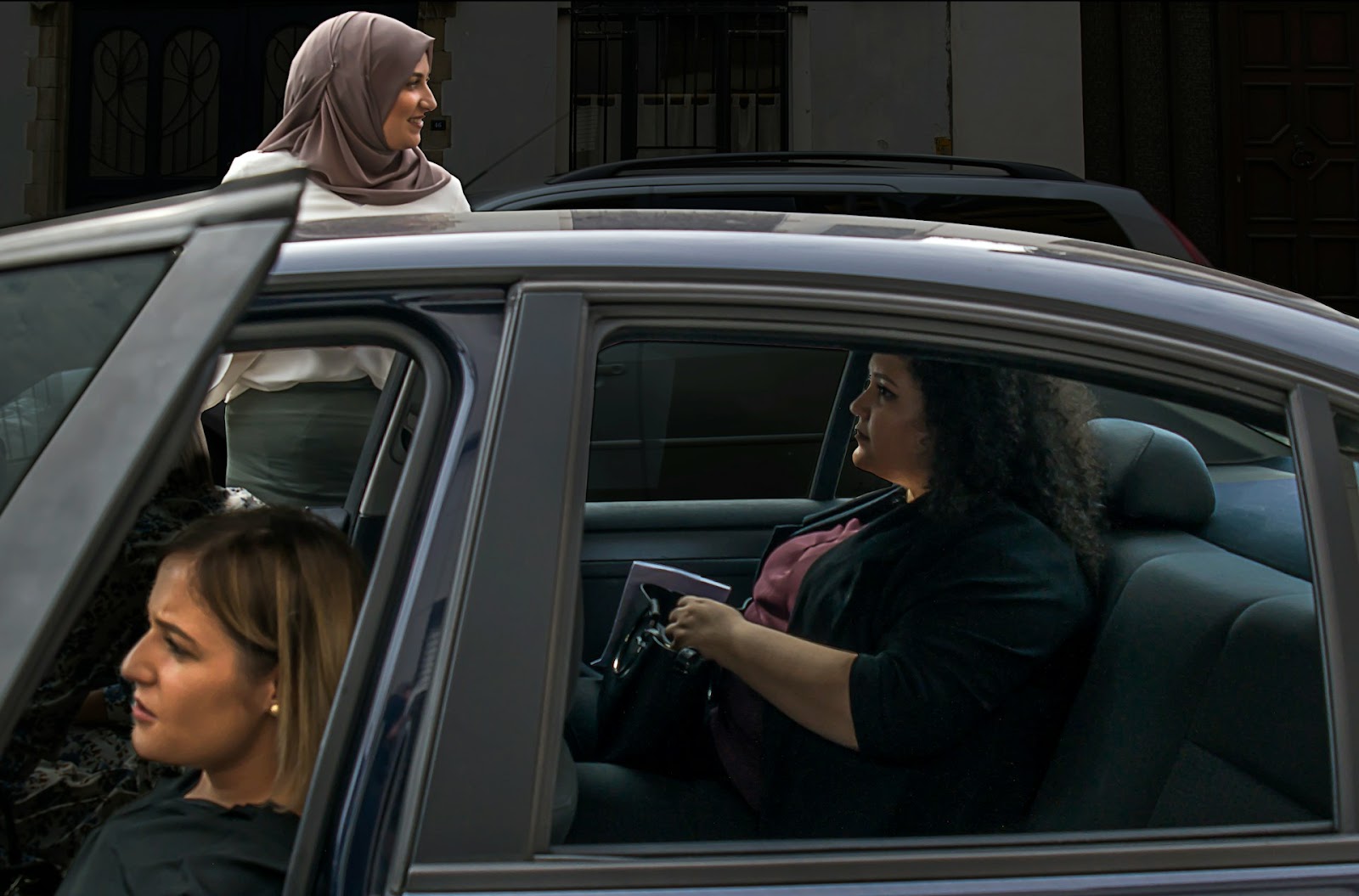 Women sat inside a ride-sharing car