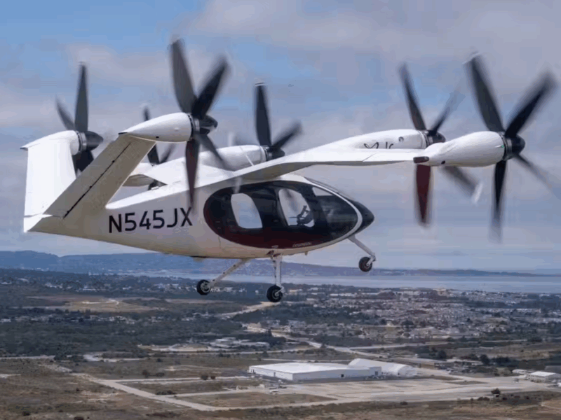 An image of a Joby Aviation aircraft mid-flight