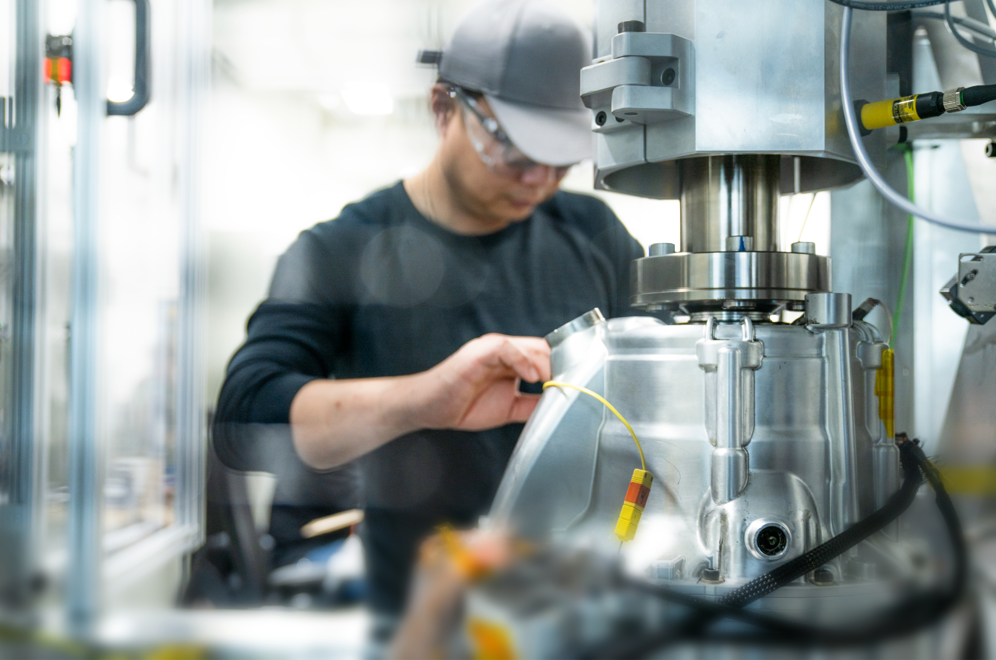 A person manufacturing a product