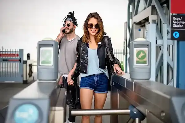 Smiling couple going through gate