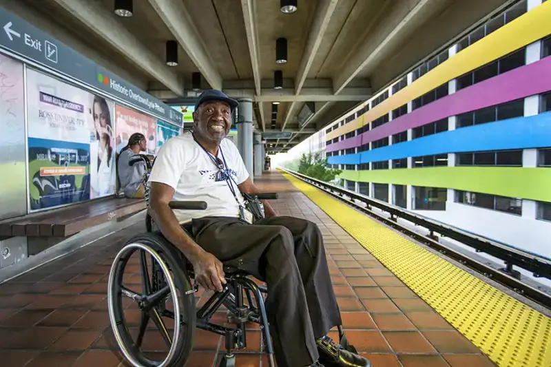 Miami Wheelchair Rider at train station