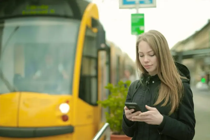 girl looking at her phone