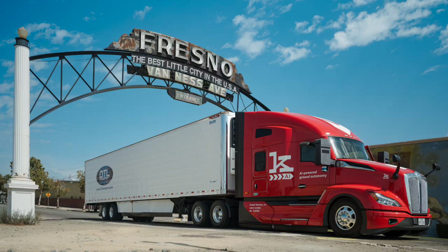 A red cabbbed truck